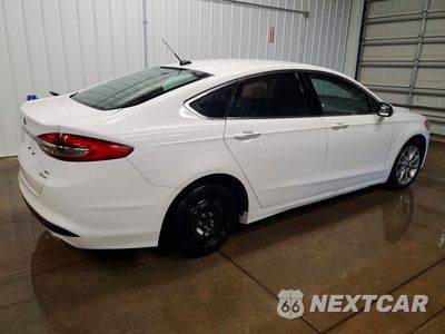 Trzecie zdjęcie samochodu z tyłu: 2017 FORD FUSION SE VIN:3FA6P0HD7HR301055 - miniatura