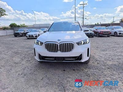 Piąte zdjęcie samochodu w środku: 2026 BMW X5 XDRIVE40I VIN:5UX23EU09T9299011 - miniatura