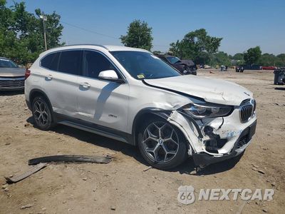 Czwarte zdjęcie samochodu z boku: 2018 BMW X1 XDRIVE28I VIN:WBXHT3C37J5K30028 - miniatura