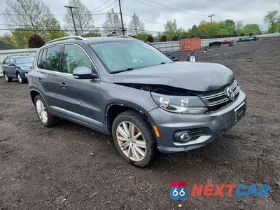 Czwarte zdjęcie samochodu z boku: 2013 VOLKSWAGEN TIGUAN S VIN:WVGAV3AX3DW076023 - miniatura