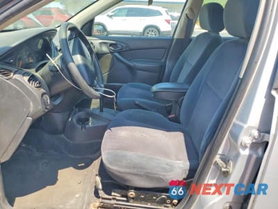 Zdjęcie 7 z 12 samochodu: 2001 FORD FOCUS SE VIN:1FAFP34331W161099 - miniatura
