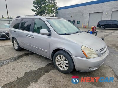 Czwarte zdjęcie samochodu z boku: 2010 KIA SEDONA EX VIN:KNDMH4C3XA6341282 - miniatura