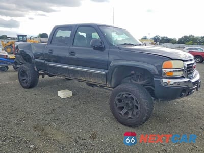 Czwarte zdjęcie samochodu z boku: 2003 GMC SIERRA K1500 HEAVY DUTY VIN:1GTGK13U63F210147 - miniatura