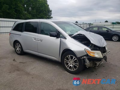 Czwarte zdjęcie samochodu z boku: 2011 HONDA ODYSSEY EXL VIN:5FNRL5H61BB048020 - miniatura