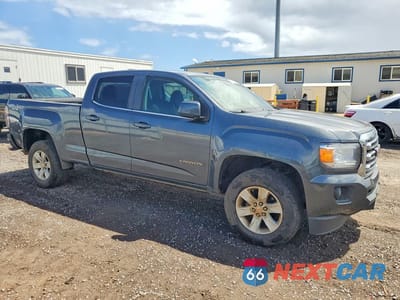 Czwarte zdjęcie samochodu z boku: 2016 GMC CANYON SLE VIN:1GTG6CE37G1378452 - miniatura