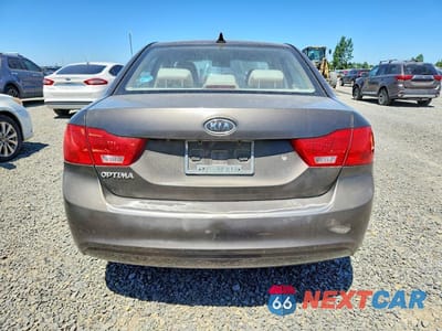 Zdjęcie 6 z 12 samochodu: 2010 KIA OPTIMA LX VIN:KNAGG4A87A5389159 - miniatura