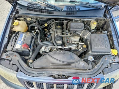 Zdjęcie 12 z 13 samochodu: 2004 JEEP GRAND CHEROKEE LAREDO VIN:1J8GX48SX4C295659 - miniatura