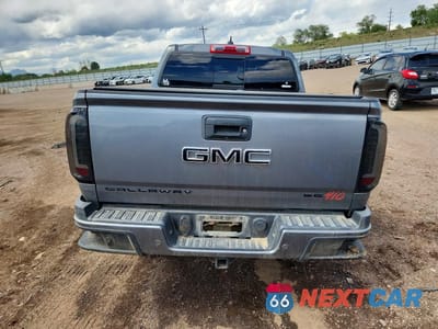Zdjęcie 6 z 13 samochodu: 2021 GMC CANYON AT4 VIN:1GTG6FENXM1116164 - miniatura