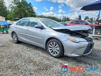Czwarte zdjęcie samochodu z boku: 2016 TOYOTA CAMRY HYBRID XLE VIN:4T1BD1FK5GU187276 - miniatura