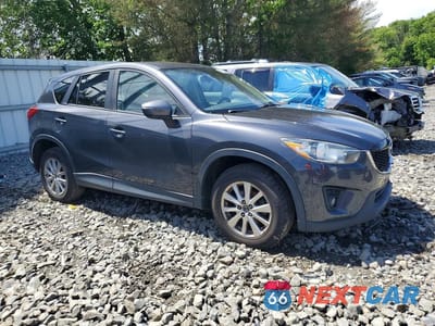 Czwarte zdjęcie samochodu z boku: 2015 MAZDA CX-5 TOURING VIN:JM3KE4CY2F0528769 - miniatura