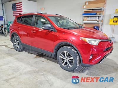 Czwarte zdjęcie samochodu z boku: 2016 TOYOTA RAV 4 VIN:JTMWFREV5GJ086637 - miniatura