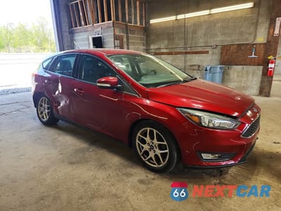 Czwarte zdjęcie samochodu z boku: 2015 FORD FOCUS SE VIN:1FADP3K28FL346971 - miniatura