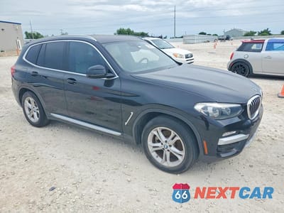 Czwarte zdjęcie samochodu z boku: 2019 BMW X3 SDRIVE30I VIN:5UXTR7C51KLF31715 - miniatura