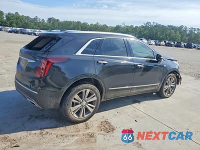 Trzecie zdjęcie samochodu z tyłu: 2023 CADILLAC XT5 PLATINUM PREMIUM LUXURY VIN:1GYKNERS8PZ205335 - miniatura