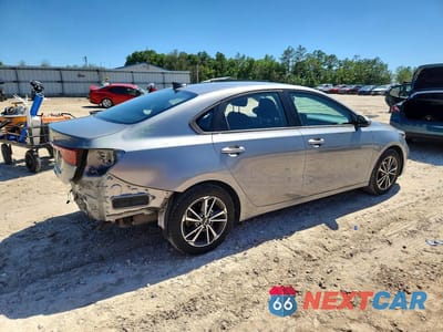 Trzecie zdjęcie samochodu z tyłu: 2023 KIA FORTE LXS VIN:3KPF24AD1PE506306 - miniatura