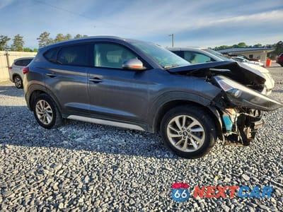Czwarte zdjęcie samochodu z boku: 2017 HYUNDAI TUCSON SE VIN:KM8J3CA40HU509410 - miniatura