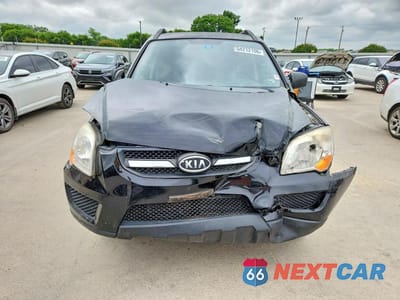 Piąte zdjęcie samochodu w środku: 2009 KIA SPORTAGE LX VIN:KNDJF724897579299 - miniatura