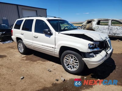 Czwarte zdjęcie samochodu z boku: 2003 JEEP GRAND CHEROKEE LIMITED VIN:1J8GW58N53C524671 - miniatura
