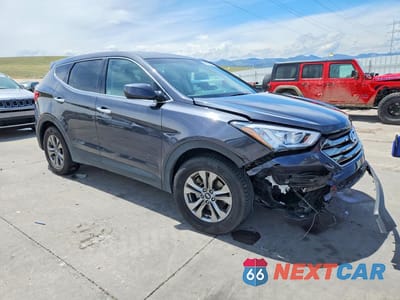 Czwarte zdjęcie samochodu z boku: 2016 HYUNDAI SANTA FE SPORT 2.4L VIN:5XYZTDLB5GG361599 - miniatura