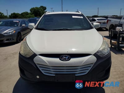 Piąte zdjęcie samochodu w środku: 2011 HYUNDAI TUCSON GLS VIN:KM8JU3AC3BU314543 - miniatura