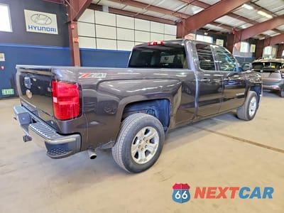 Trzecie zdjęcie samochodu z tyłu: 2015 CHEVROLET SILVERADO K1500 LT VIN:1GCVKREC0FZ319183 - miniatura