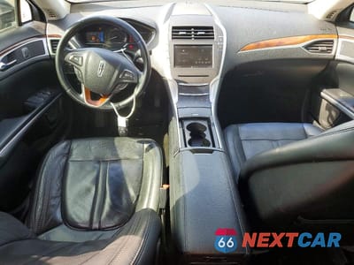 Zdjęcie 8 z 12 samochodu: 2016 LINCOLN MKZ HYBRID VIN:3LN6L2LU2GR634041 - miniatura