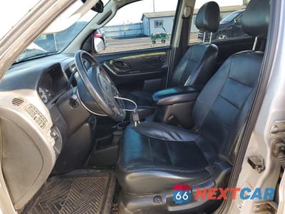 Zdjęcie 7 z 13 samochodu: 2003 FORD ESCAPE LIMITED VIN:1FMCU94173KC66810 - miniatura