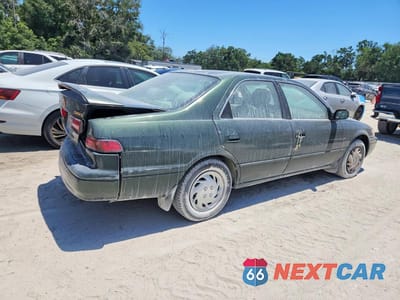 Trzecie zdjęcie samochodu z tyłu: 1999 TOYOTA CAMRY LE VIN:4T1BG22K6XU918929 - miniatura