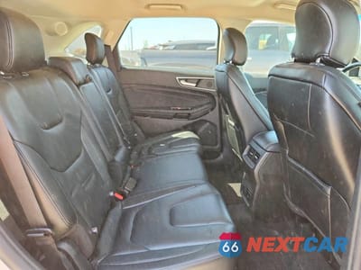 Zdjęcie 10 z 12 samochodu: 2019 FORD EDGE TITANIUM VIN:2FMPK4K99KBC62401 - miniatura