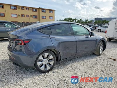 Trzecie zdjęcie samochodu z tyłu: 2023 TESLA MODEL Y VIN:7SAYGDEE8PA041661 - miniatura