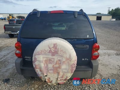 Zdjęcie 6 z 14 samochodu: 2004 JEEP LIBERTY SPORT VIN:1J4GL48K24W192747 - miniatura