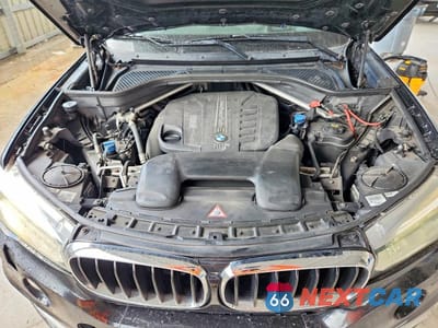 Zdjęcie 12 z 13 samochodu: 2014 BMW X5 XDRIVE35D VIN:5UXKS4C55E0J95195 - miniatura