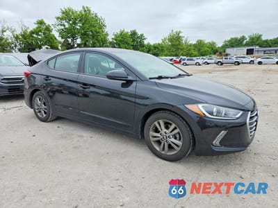 Czwarte zdjęcie samochodu z boku: 2017 HYUNDAI ELANTRA VALUE EDITION VIN:5NPD84LF6HH152249 - miniatura