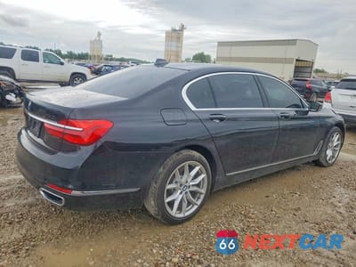 Trzecie zdjęcie samochodu z tyłu: 2016 BMW 740 I VIN:WBA7E2C50GG714437 - miniatura