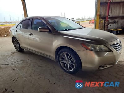 Czwarte zdjęcie samochodu z boku: 2009 TOYOTA CAMRY HYBRID VIN:JTNBB46K993052205 - miniatura