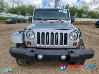 Piąte zdjęcie samochodu w środku: 2013 JEEP WRANGLER UNLIMITED SAHARA VIN:1C4BJWEG3DL635829 - miniatura