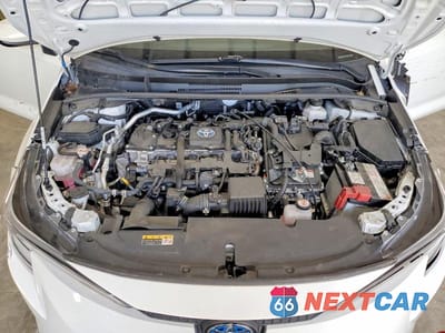 Zdjęcie 11 z 13 samochodu: 2023 TOYOTA COROLLA HYBRID LE VIN:JTDBDMHE1P3006094 - miniatura