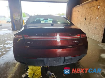 Zdjęcie 6 z 12 samochodu: 2015 LINCOLN MKZ VIN:3LN6L2J92FR614031 - miniatura