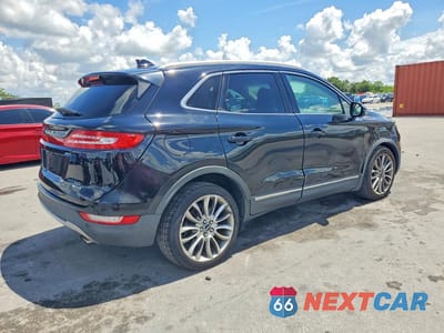Trzecie zdjęcie samochodu z tyłu: 2016 LINCOLN MKC VIN:5LMCJ3C94GUJ04444 - miniatura
