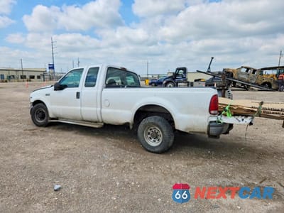 Trzecie zdjęcie samochodu z tyłu: 1999 FORD F250 SUPER DUTY VIN:1FTNX20LXXEC67831 - miniatura