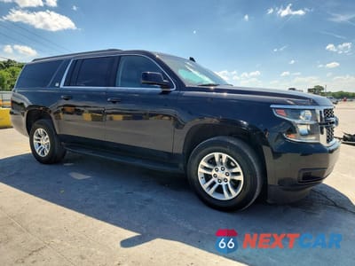 Czwarte zdjęcie samochodu z boku: 2020 CHEV SUBURBAN C1500 LT VIN:1GNSCHKC1LR301602 - miniatura