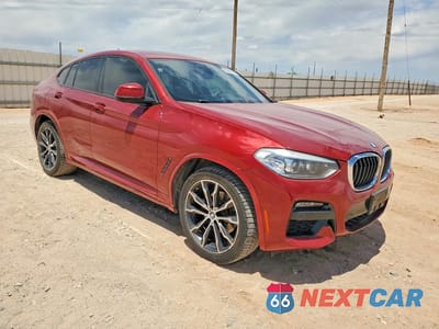 Czwarte zdjęcie samochodu z boku: 2020 BMW X4 XDRIVE30I VIN:5UX2V1C05L9B89922 - miniatura