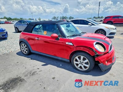 Czwarte zdjęcie samochodu z boku: 2010 MINI COOPER S VIN:WMWMS3C51ATY08889 - miniatura