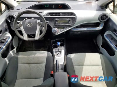 Zdjęcie 8 z 13 samochodu: 2012 TOYOTA PRIUS C TWO VIN:JTDKDTB35C1010740 - miniatura