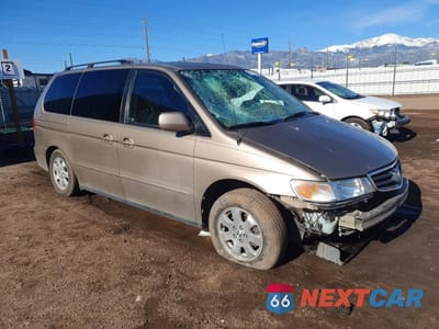 Czwarte zdjęcie samochodu z boku: 2003 HONDA ODYSSEY EXL VIN:2HKRL18923H504824 - miniatura