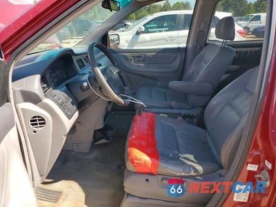 Zdjęcie 7 z 13 samochodu: 2002 HONDA ODYSSEY EXL VIN:2HKRL18002H565797 - miniatura