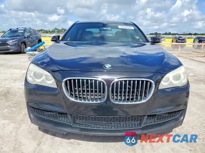Piąte zdjęcie samochodu w środku: 2015 BMW 740 I VIN:WBAYA6C58FGK16332 - miniatura