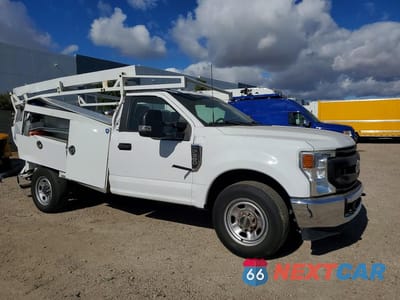 Czwarte zdjęcie samochodu z boku: 2022 FORD F350 SUPER DUTY VIN:1FDRF3E6XNEC66944 - miniatura
