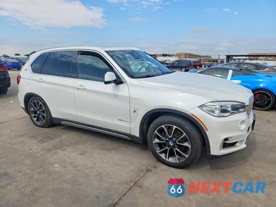 Czwarte zdjęcie samochodu z boku: 2018 BMW X5 XDR40E VIN:5UXKT0C57J0W02952 - miniatura