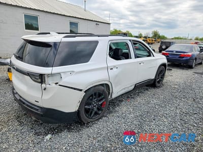 Trzecie zdjęcie samochodu z tyłu: 2018 CHEVROLET TRAVERSE PREMIER VIN:1GNEVJKW1JJ157876 - miniatura